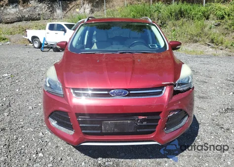 2016 Ford Escape Titanium z USA, uszkodzony, nr VIN 1FMCU9J93GUB10574